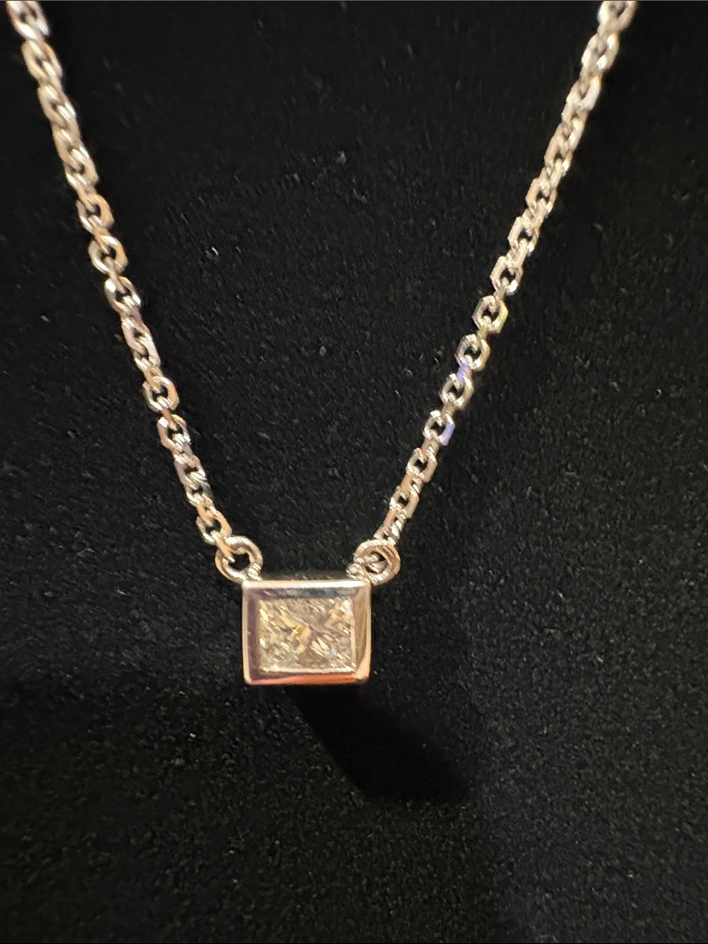 Princess Diamond pendant necklace in 14kt WG.